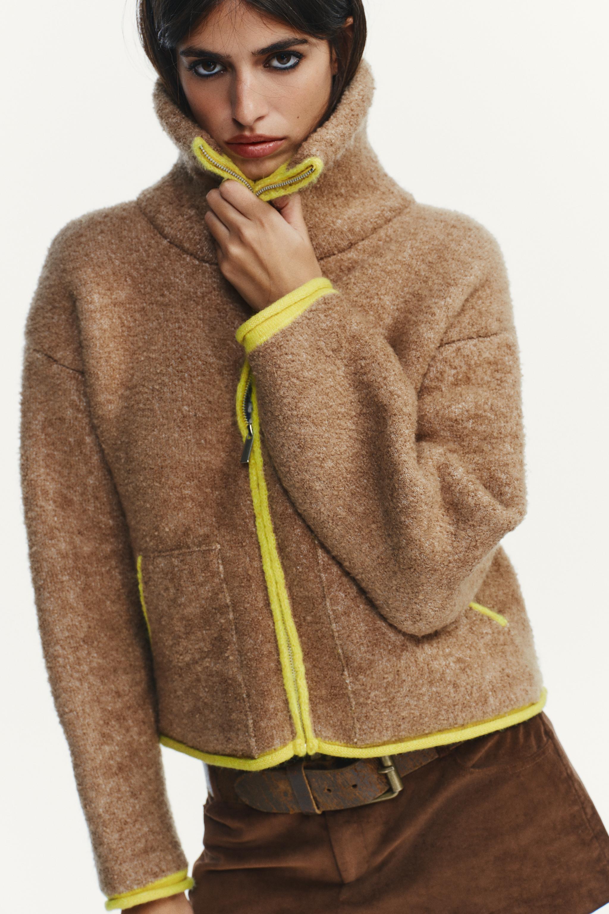 GILET EN MAILLE À FINITIONS CONTRASTANTES